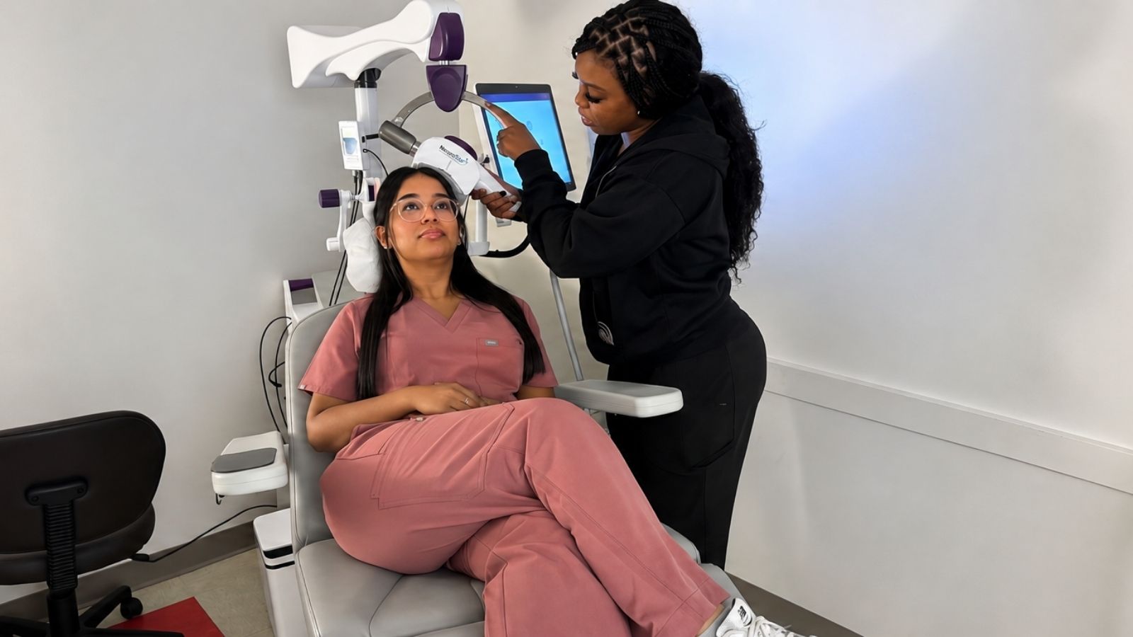 A Ross Bridge Medical Center provider administering NeuroStar® TMS treatment to a patient